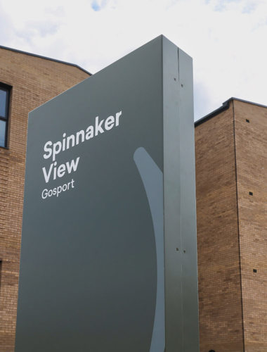 Exterior of Spinnaker View focusing on the signage.