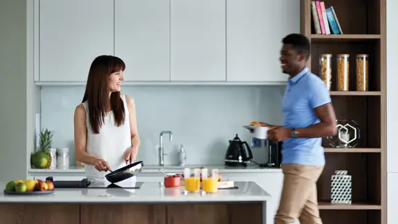 Man And Woman In Kitchen