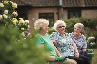 Ladies chatting in garden