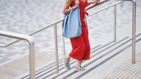 Woman Walking Up Steps